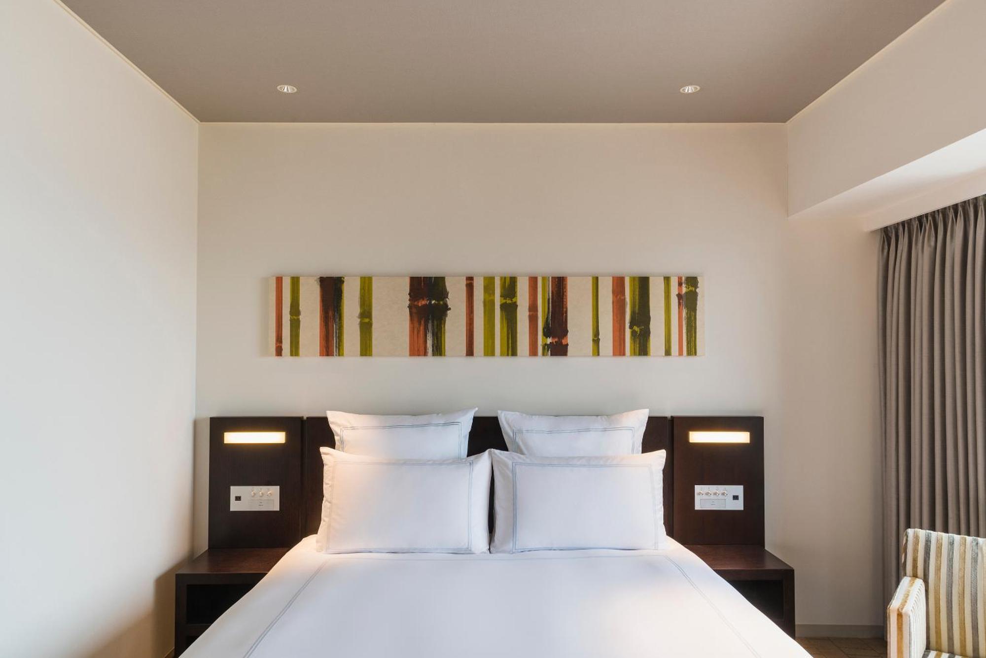 سويس أوتيل نانكاي أوساكا المظهر الخارجي الصورة A bedroom at the hotel